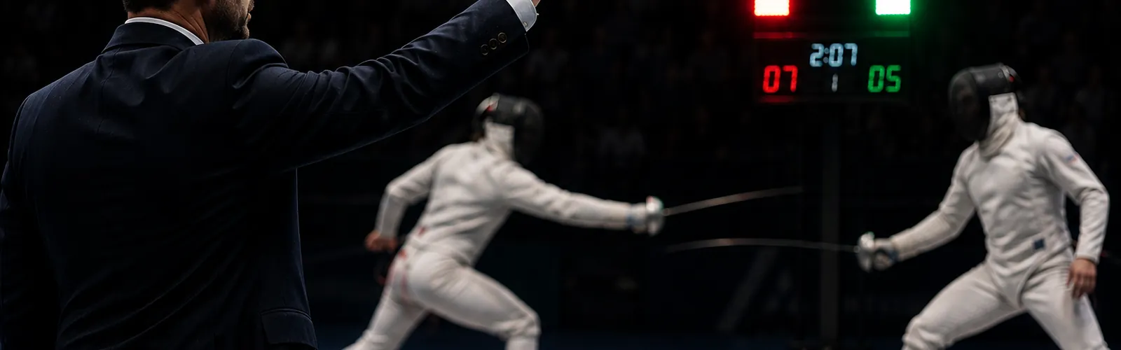 A fencing referee mid-call with an arm raised